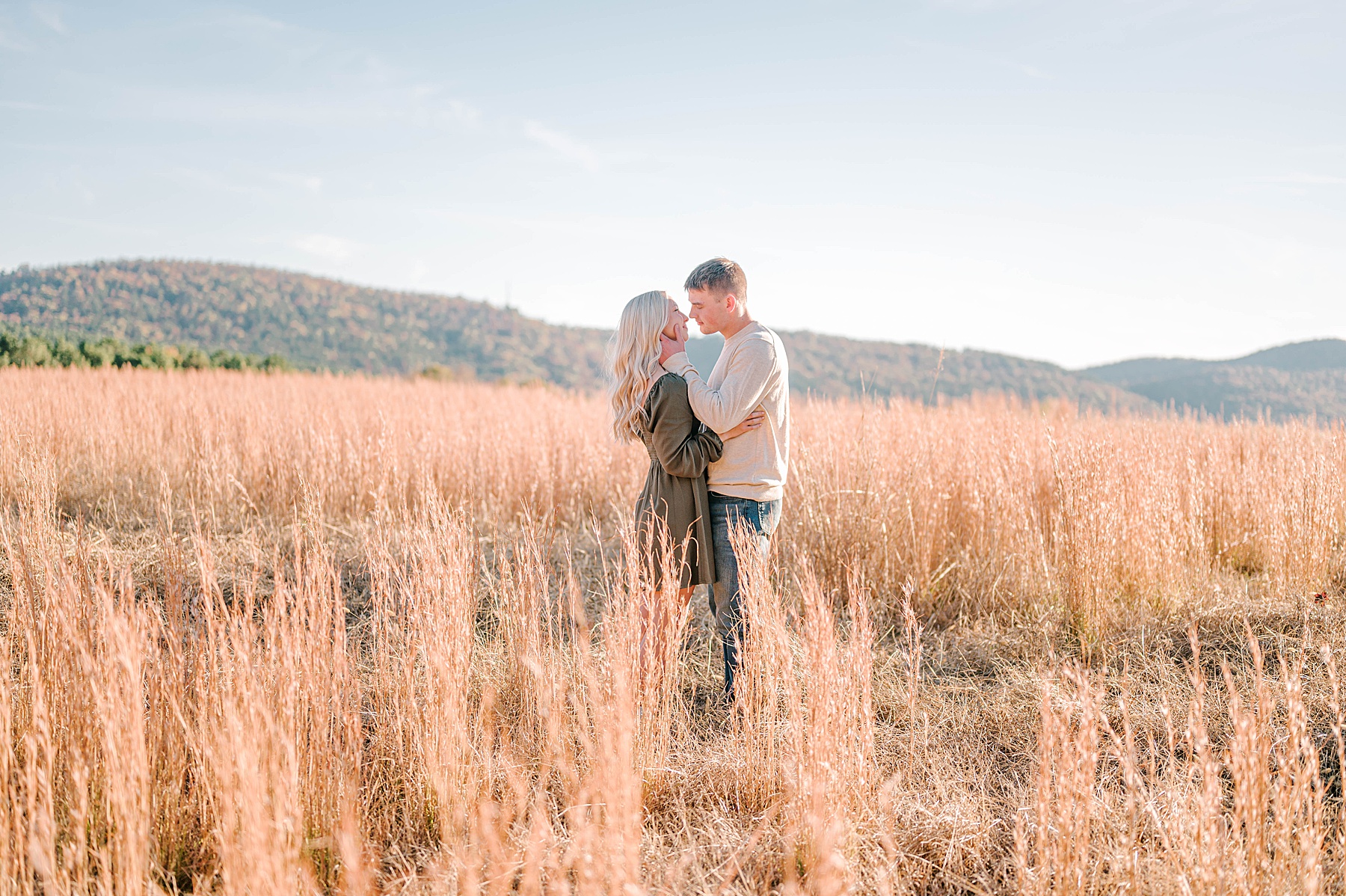 Couple in a tall grassy field