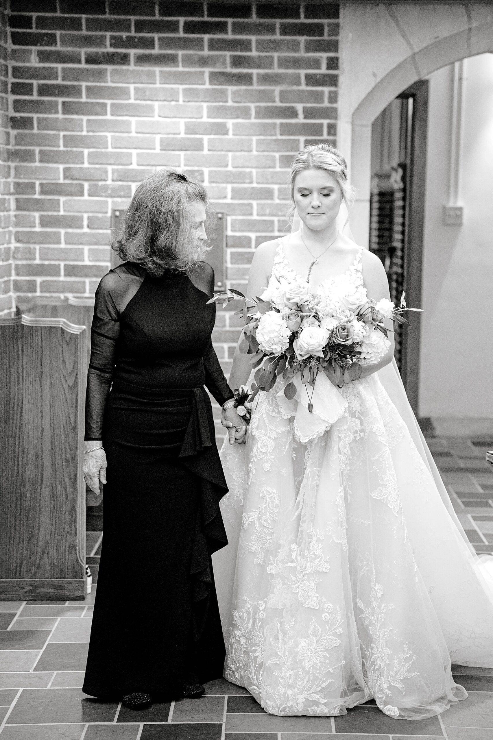 Bride and grandmother walking down the aisle