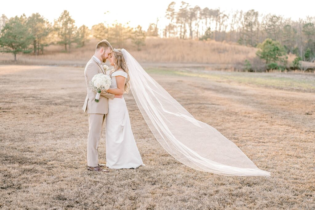 Bride and groom sunset portraits at Stonebrook Meadows