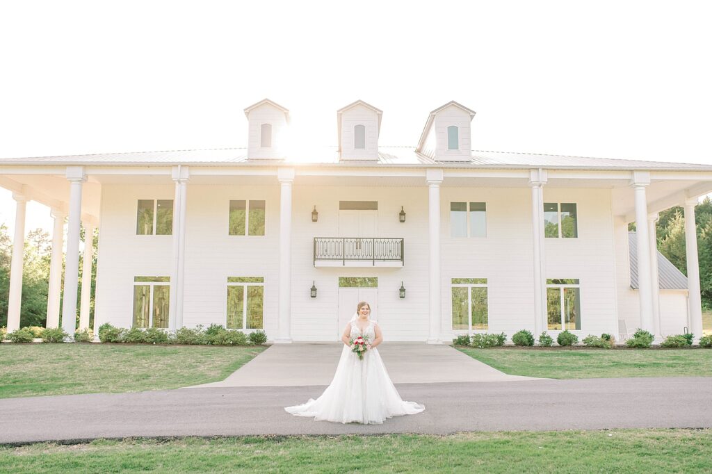 Legacy Acres Bridal Portrait in front of ballroom